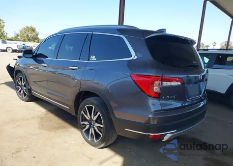 2020 Honda Pilot Awd Touring 8 Passenger z USA, uszkodzony, nr VIN 5FNYF6H94LB062403